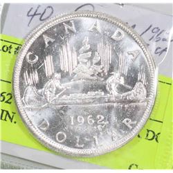1962 CANADIAN SILVER DOLLAR COIN.
