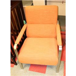 SHOWHOME ORANGE FABRIC AND METAL ARMCHAIR
