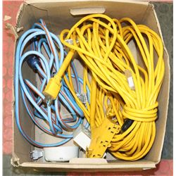BOX W/ 2 EXTENSION CORDS & 2 MULTI-PLUGS INCLUDES
