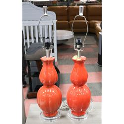 PAIR OF ORANGE SHOW HOME LAMPS NO SHADES