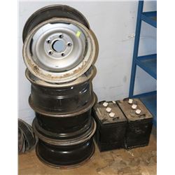 SET OF FIVE 5 BOLT RIMS SOLD W/2 BATTERIES - AS IS