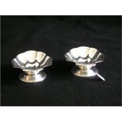 Une paire de coquilles à beurre en argent de Petersen.