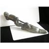 Image 1 : Une sculpture inuit en stéatite représentant un chasseur tirant un ours qu’il vient de tuer, signée,