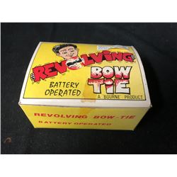 VINTAGE BATTERY OPERATED REVOLVING BOW TIE