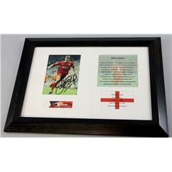 Steven Gerrard - A signed limited edition Liverpool FC montage 16 x 12 inches and a signed photograp
