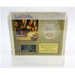 Pirates of the Caribbean - A box framed original sfx gold coin from the pirates treasure cave, 11 x 