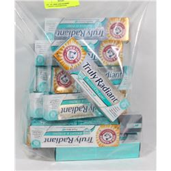 BAG OF ARM AND HAMMER TRULY RADIANT TOOTHPASTE.