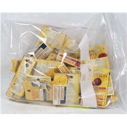 BAG OF ASSORTED BERTS BEES LIP BALM.