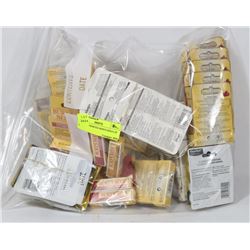 BAG OF ASSORTED BERTS BEES LIP BALM.