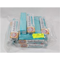 BAG OF ASSORTED TOOTHPASTES.