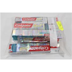 BAG OF ASSORTED TOOTHPASTES.