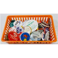 BASKET OF VINTAGE PIN BACK BUTTONS.