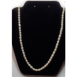 7) AEO 26 STRAND OF FRESHWATER PEARLS.