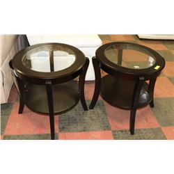 PAIR OF OVAL WOOD & GLASS END TABLES.