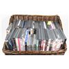 Image 1 : LOT OF DVDS & CDS IN WICKER BASKET.