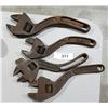 Image 1 : FOUR ANTIQUE S CURVE ADJUSTIBLE WRENCHES