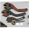 Image 1 : FOUR ANTIQUE S CURVE WRENCHES