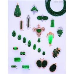 A JADEITE AND DIAMOND-SET BROOCH PENDANT;the spinach green jadeite bar within a brilliant-cut and pe