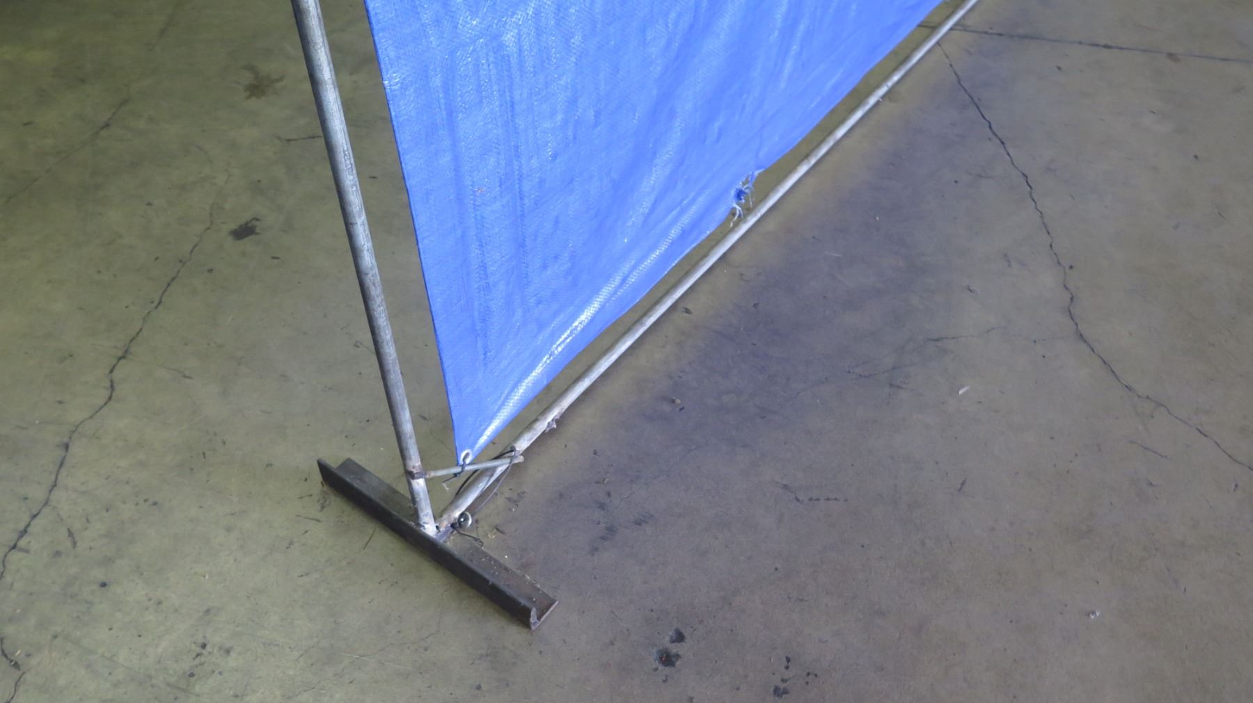 Pipe Rack Frame w/ Stretched Blue Tarp (Temporary Divider)
