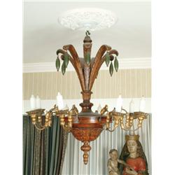 Early 19th Century Eight Branch Chandelier the gilded scrolling arms supported on a carved wood cent