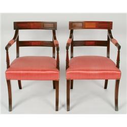 Pair of Regency Period Mahogany Open Arm Chairs stuffed seats and arm pads in rose upholstery,  on f