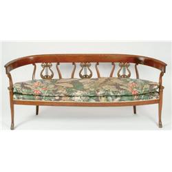 Early 19th Century Italian Mahogany Framed Settee the bowed chair back with three dolphin and lyre s