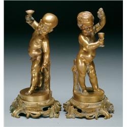 Pair of French Gilt Bronze Figures of Revelling Putti on moulded scrollwork bases, ht. 9.4"" - 24 cm