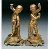 Image 1 : Pair of French Gilt Bronze Figures of Revelling Putti on moulded scrollwork bases, ht. 9.4"" - 24 cm