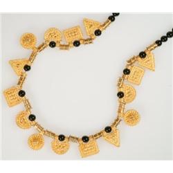 22k Yellow Gold And Onyx Fringe Necklace formed of onyx beads and gold cylinders supporting a fringe