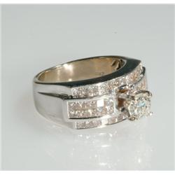18k White Gold Cocktail Ring set with a brilliant cut diamond (approx. 0.70ct.) on a tiered field of