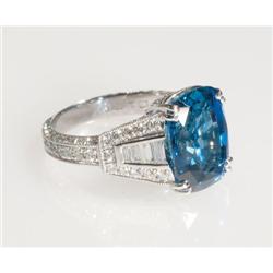Platinum Filigree Cocktail Ring set with a fine oval cushion sapphire (approx. 8.73ct.) in a flaring