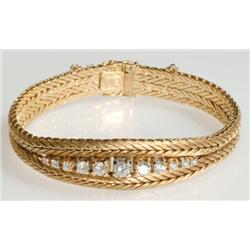 18k Yellow Gold Mesh Bracelet set with a graduated row of 11 brilliant cut diamonds (approx. 1.35ct.
