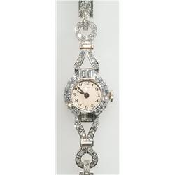 Lady's Eszeha Wristwatch circa 1955; 17 jewel movement; blue steel hands and black enamel Arabic num