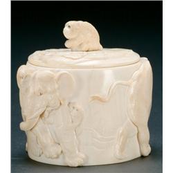 Ivory Covered Box worked from a tusk, the body with high relief elephants and macaques, the cover ma