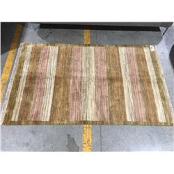 TIBET-WOOL HAND KNOTTED AREA RUG APPROX 6' 6" X 4' 1" (RETAIL VALUE $2150.00)