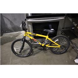 YELLOW HARO BMX BICYCLE WITH BACK TIRE BIKE PEGS