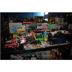 LOT OF TOYS INCLUDING PAW PATROL FIRE TRUCKS, TOOTHLESS DOLL, NERF GUNS AND ASSORTED BOOKS