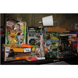 SHELF OF TOYS INCLUDING HOCKEY NET, ICE CREAM STAND, AND MORE