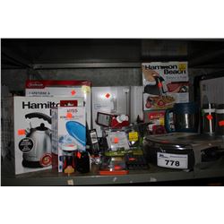 SHELF OF HOME ITEMS INCLUDING PAN, KETTLE, LAMP, AND MORE