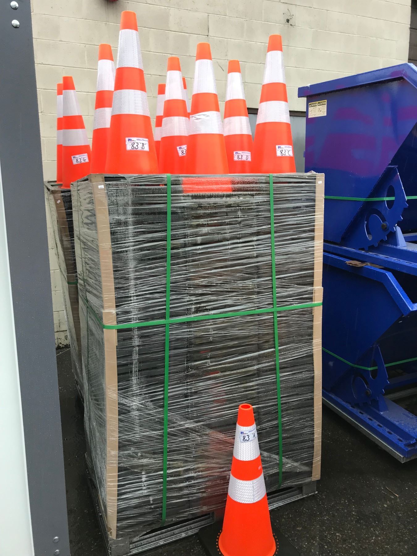 STACK OF 42 NEW ORANGE SAFETY PYLONS