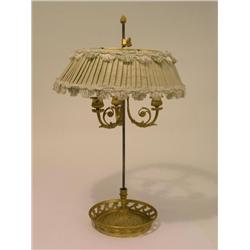 A 19th century French ormolu 3-branch candle stand, with adjusting shade and sconce on pierced tray 