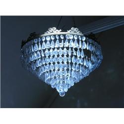 A chandelier, composed of six tiers of pendant glass lustre drops 28in. diam.  