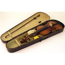 A cased violin, manufactured by Thibouvale-Lamy, 14ins with two piece back  
