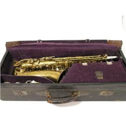 A Hawkes and Co 'Century' saxophone, in fitted case, 25ins  