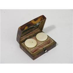 A 19th tortoiseshell vanity box, the fitted interior with two ivory pots and mirror, 2.25ins  