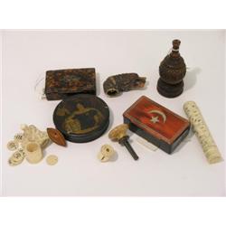 A carved fruitwood spice box, two other boxes and a small collection of ivory items including a bodk