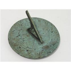 A 19th century bronze sundial, by F. Barker & Son, London, the inner ring engraved 'Light and Shadow