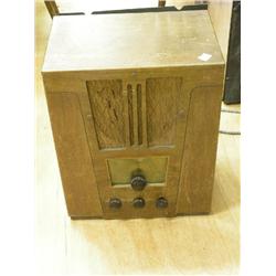 A 1930's Philco walnut radio, with Bakelite knobs, 14ins  