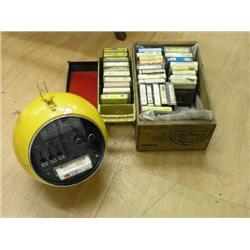 A 1970's Weltron Model 2001 8 track radio cassette player, in yellow globe shaped case with black in