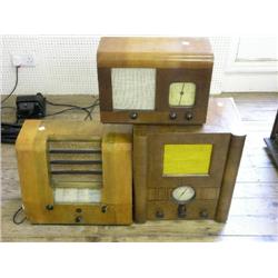 A Peto Scott Model H52 walnut radio, and two similar walnut cased radios, 18.5ins  